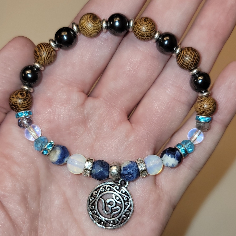 Om Bracelet: Hematite, Tiger Stripe Wood Beads, Sodalite, and Opalite